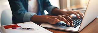 Woman studying on her laptop.